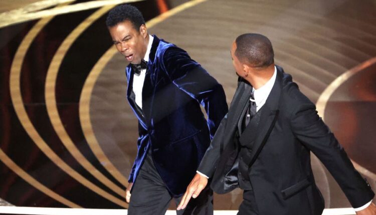 chris-rock-and-will-smith-onstage-during-the-show-at-the-news-photo-1678460273.jpg