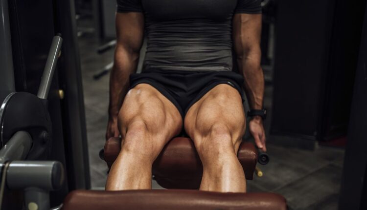 muscular-man-doing-legs-in-the-gym-royalty-free-image-1677671009.jpg