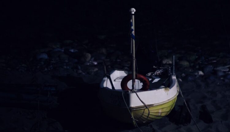 small-boat-on-the-beach-at-night-royalty-free-image-1679059644.jpg