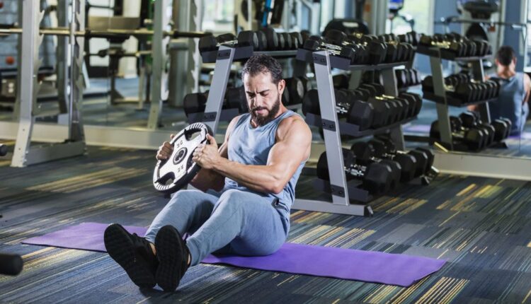middle-eastern-man-exercising-at-the-gym-lifting-royalty-free-image-1690294922.jpg