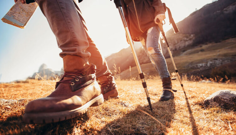 Couple-legs-hiking-with-hiking-boots-and-hiking-poles.jpg