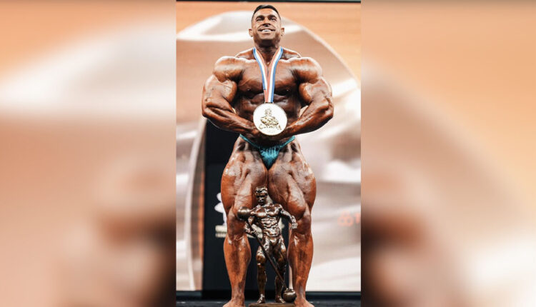 Derek-Lunsford-wearing-the-Olympia-Medal-after-winning-the-2023-Mr.-Olympia-Title.jpg