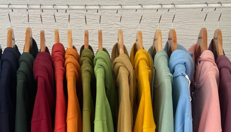 Colorful-hoodies-on-a-clothing-rack.jpg