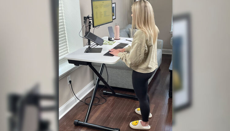 Female-working-from-home-while-using-a-Lillipad-Standing-Desk.jpg