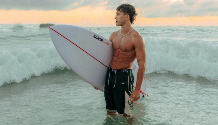 Julien-Brown-from-the-Elevator-Boys-surfing-and-showing-off-his-abs.jpg