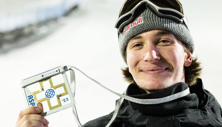 Olympic-snowboarder-Marcus-Kleveland-holding-his-olympic-pass.jpg