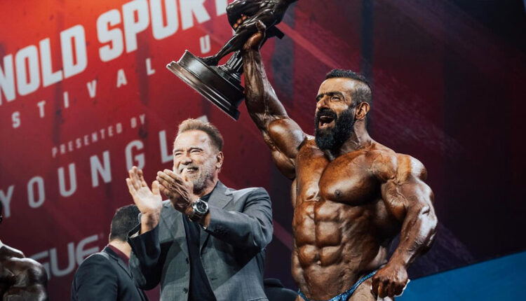 Arnold-Schwarzenegger-cheering-on-Hadid-Choopin-as-he-won-the-The-Arnold-UK.jpg